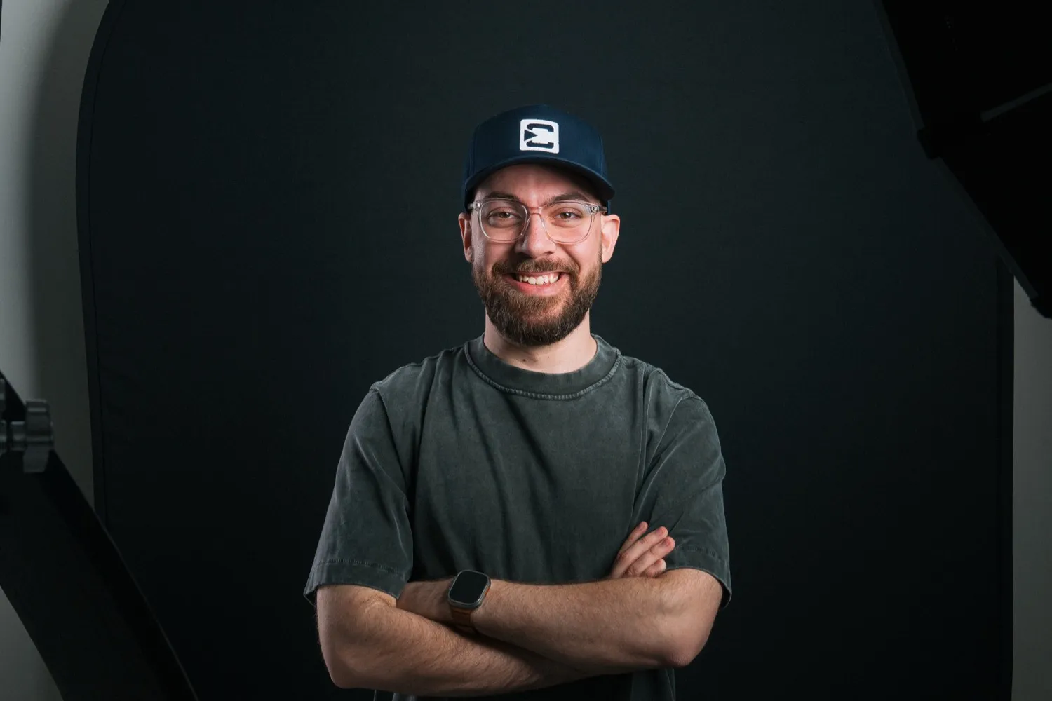 Christian Makoa, creator of the Craylor YouTube channel, smiling with arms crossed